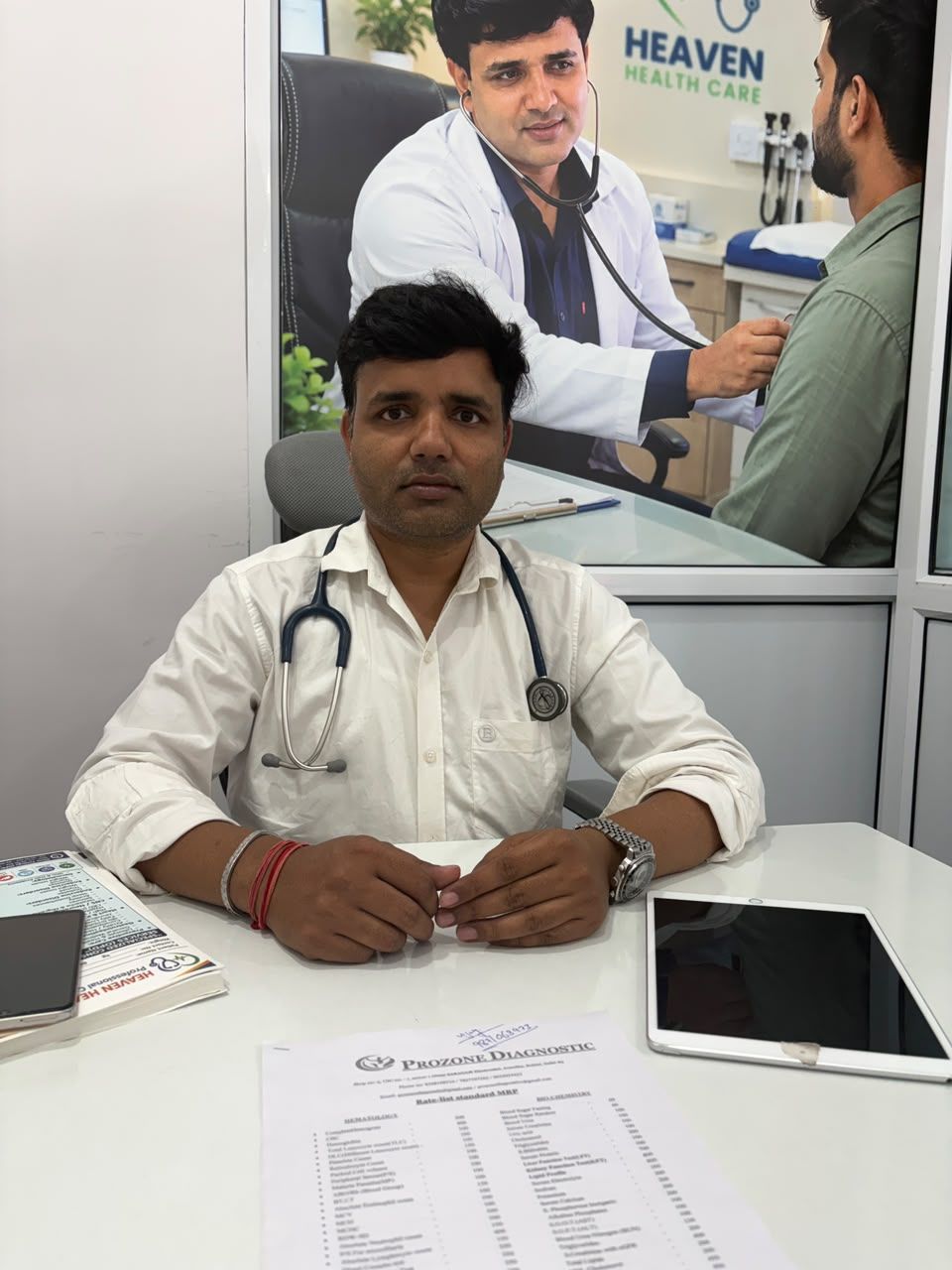 Dr. Rahul Chauhan seated at his clinic desk